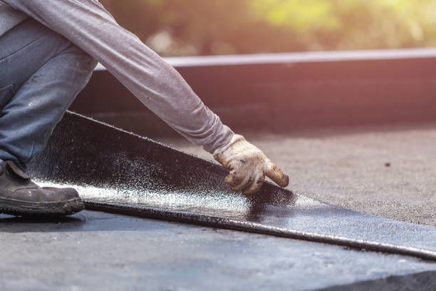 Professional Waterproofing technician working in Twin Lake, MI
